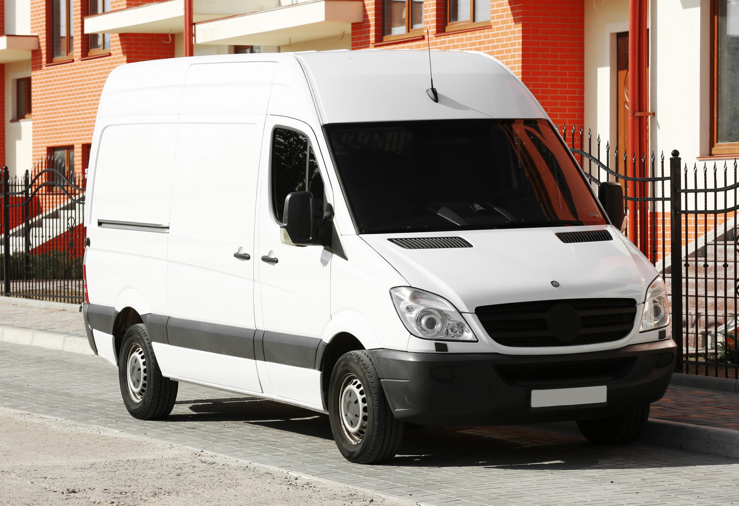 White van parked on street